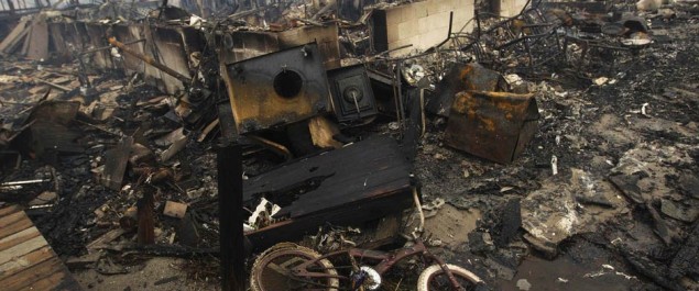 A view shows homes devastated by fire and the effects of Hurricane Sandy at the Breezy Point section of the Queens borough of New York